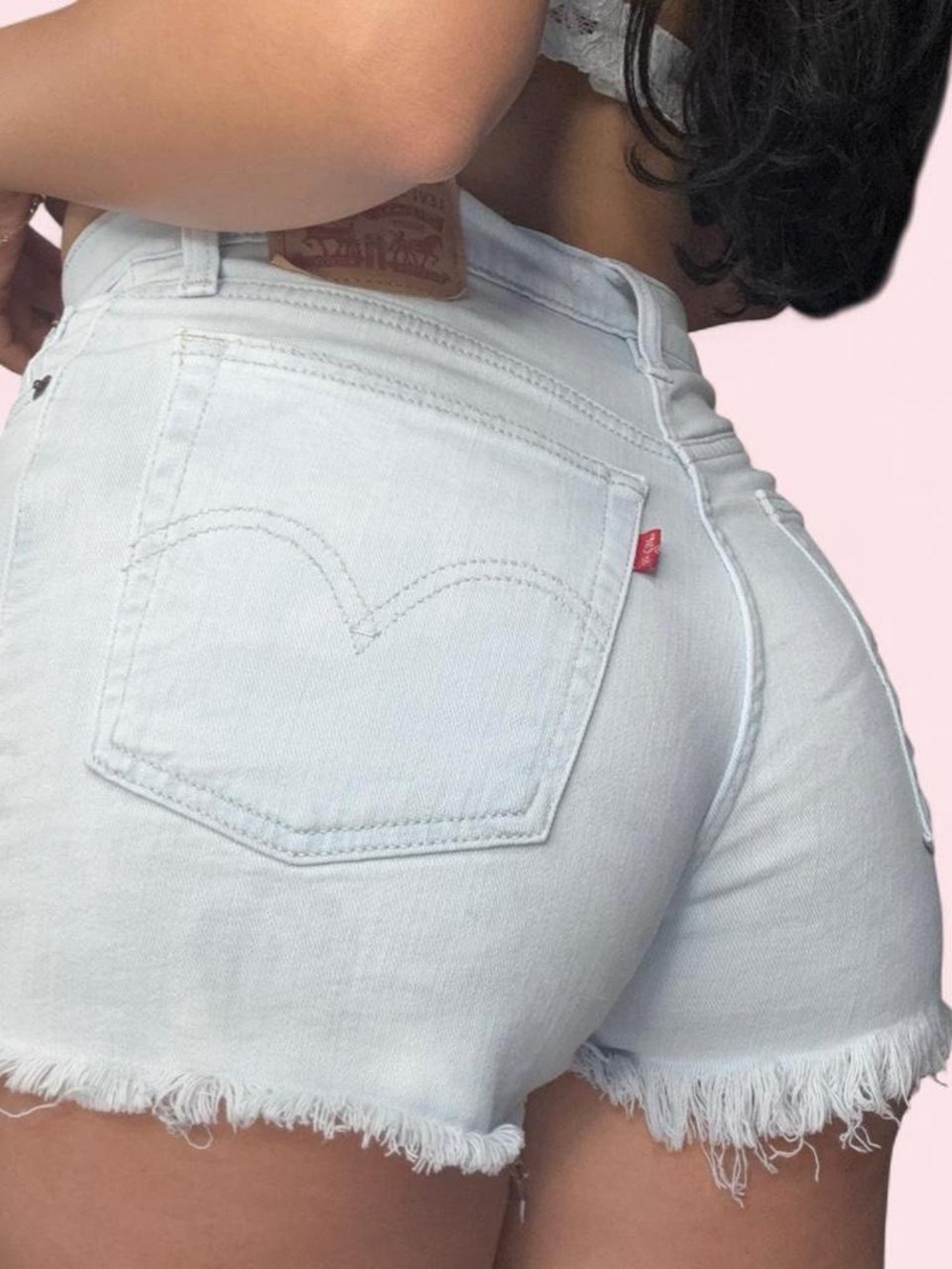 Levi's White Denim Cutoff Shorts with Frayed Hem